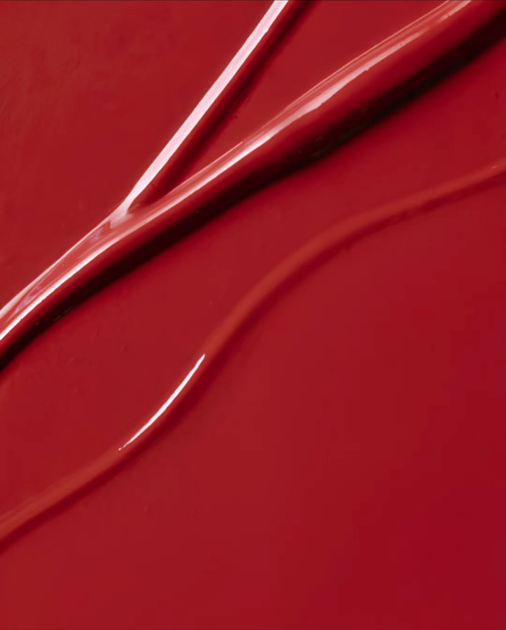 Deep red lipstick product texture close-up